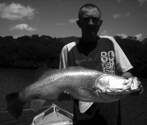 Greg Schneider of Townsville with an 88cm barra caught in Missionary Bay.